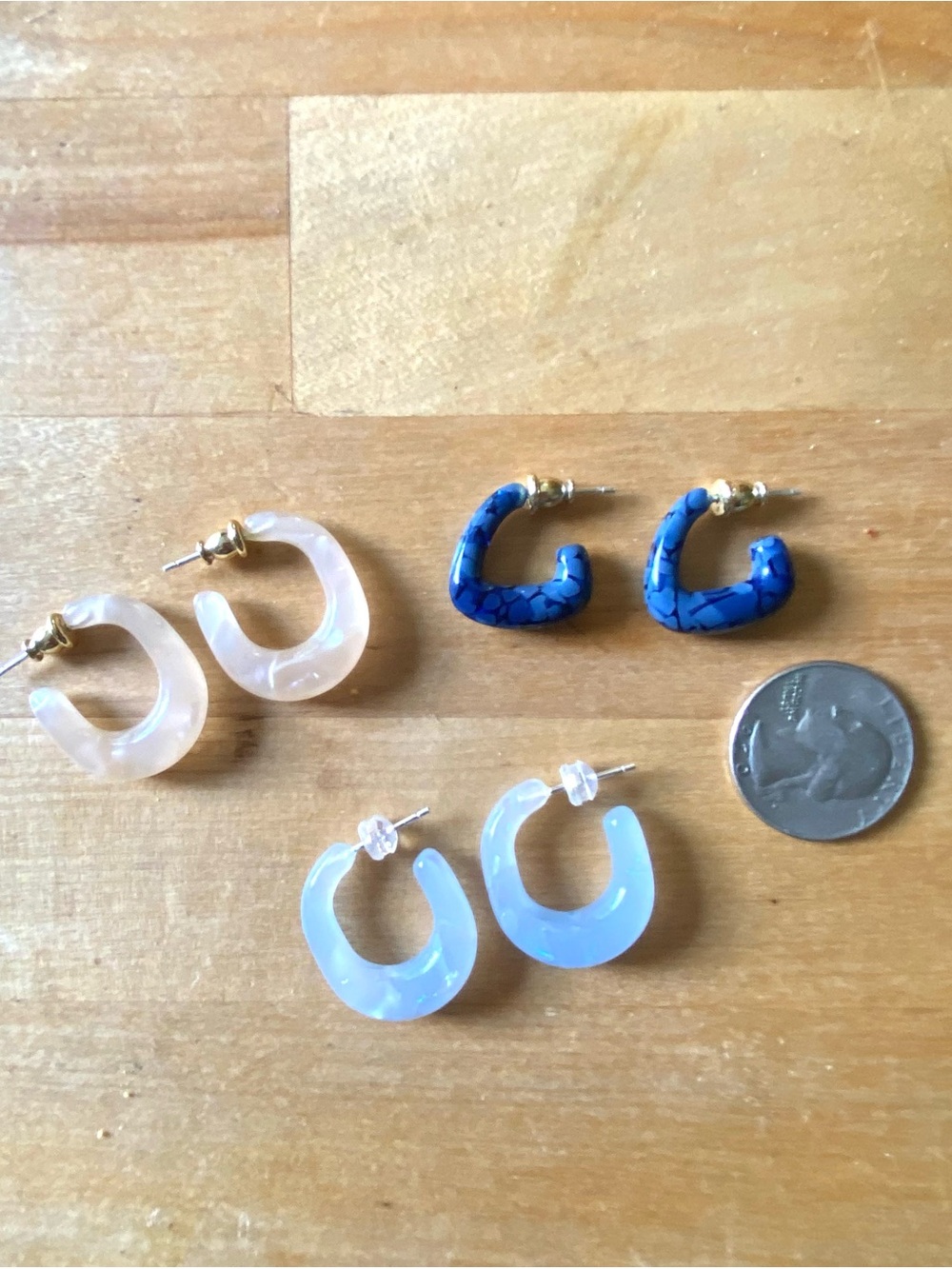 Set of 3 Resin Hoop Earrings - light pink, clear, and blue.